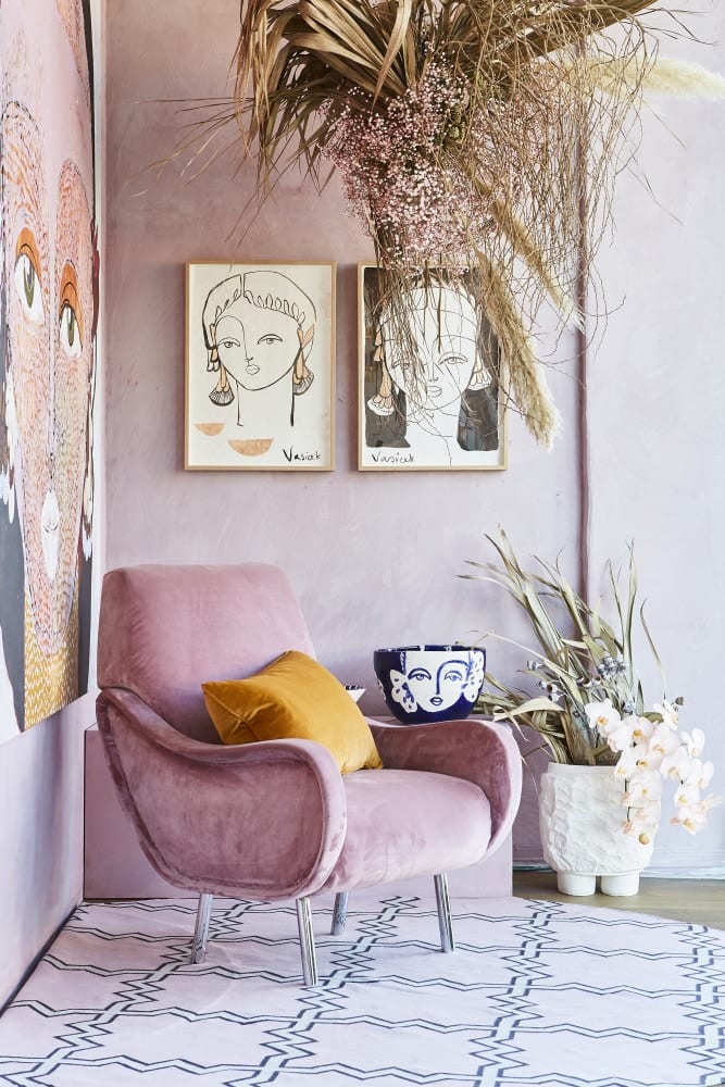 mauve limewash walls and velvet chair by Interior Designers Bauwerk