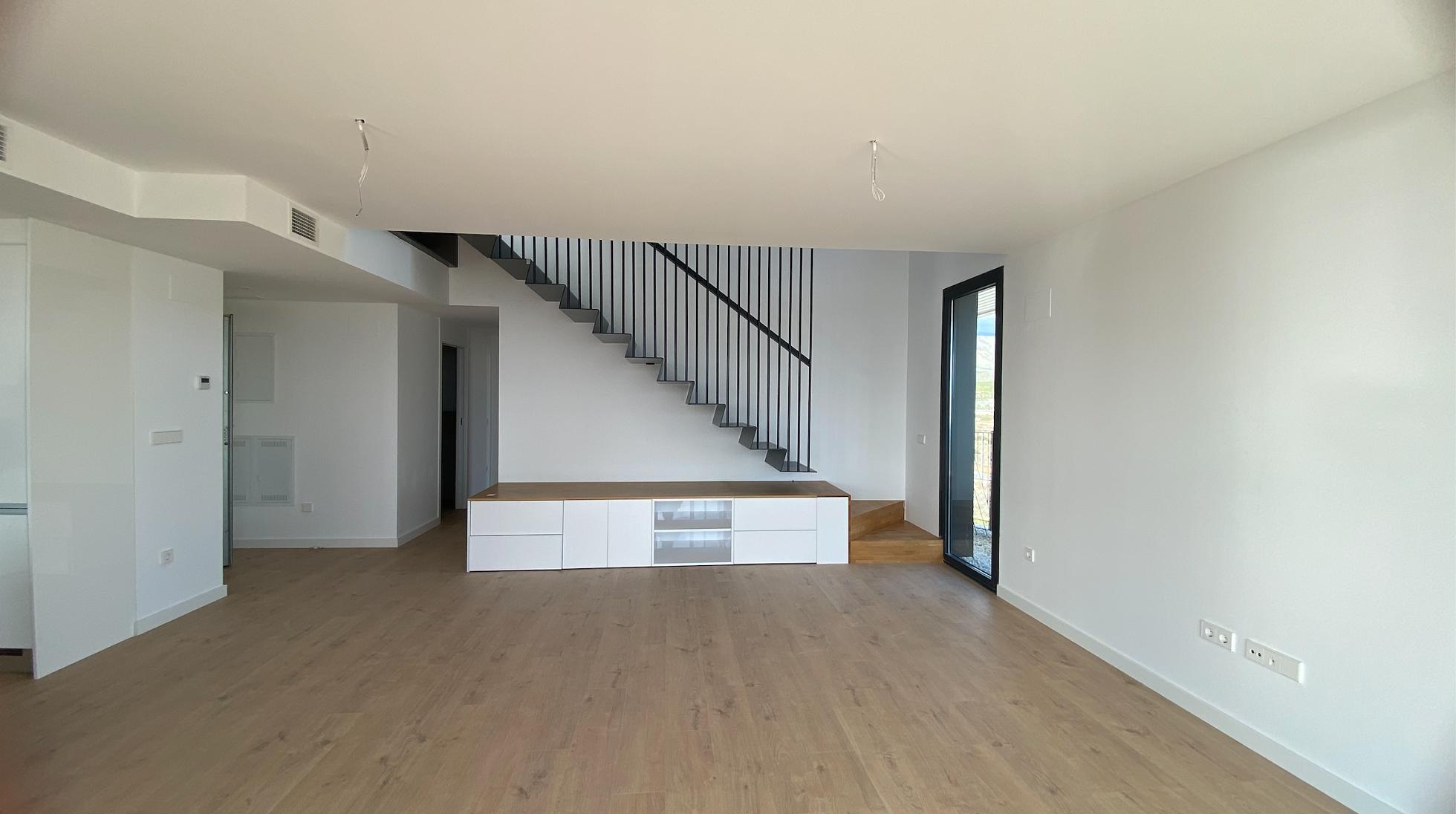 Allonbay Penthouse apartment living room and stairs